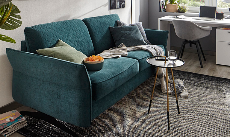 smaragdfarbenes Sofa